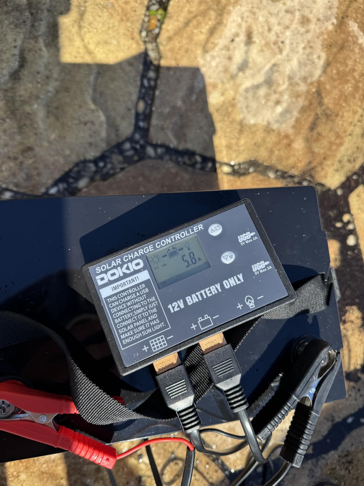 DOKIO 100W Portable Foldable Solar Panel Kit (19x26in, 5.3lb), with Separate Controller and Dual USB, Monocrystalline Charger for 12V Batteries & Power Stations, RV Camping Trailer Emergency Backup customer photo 1