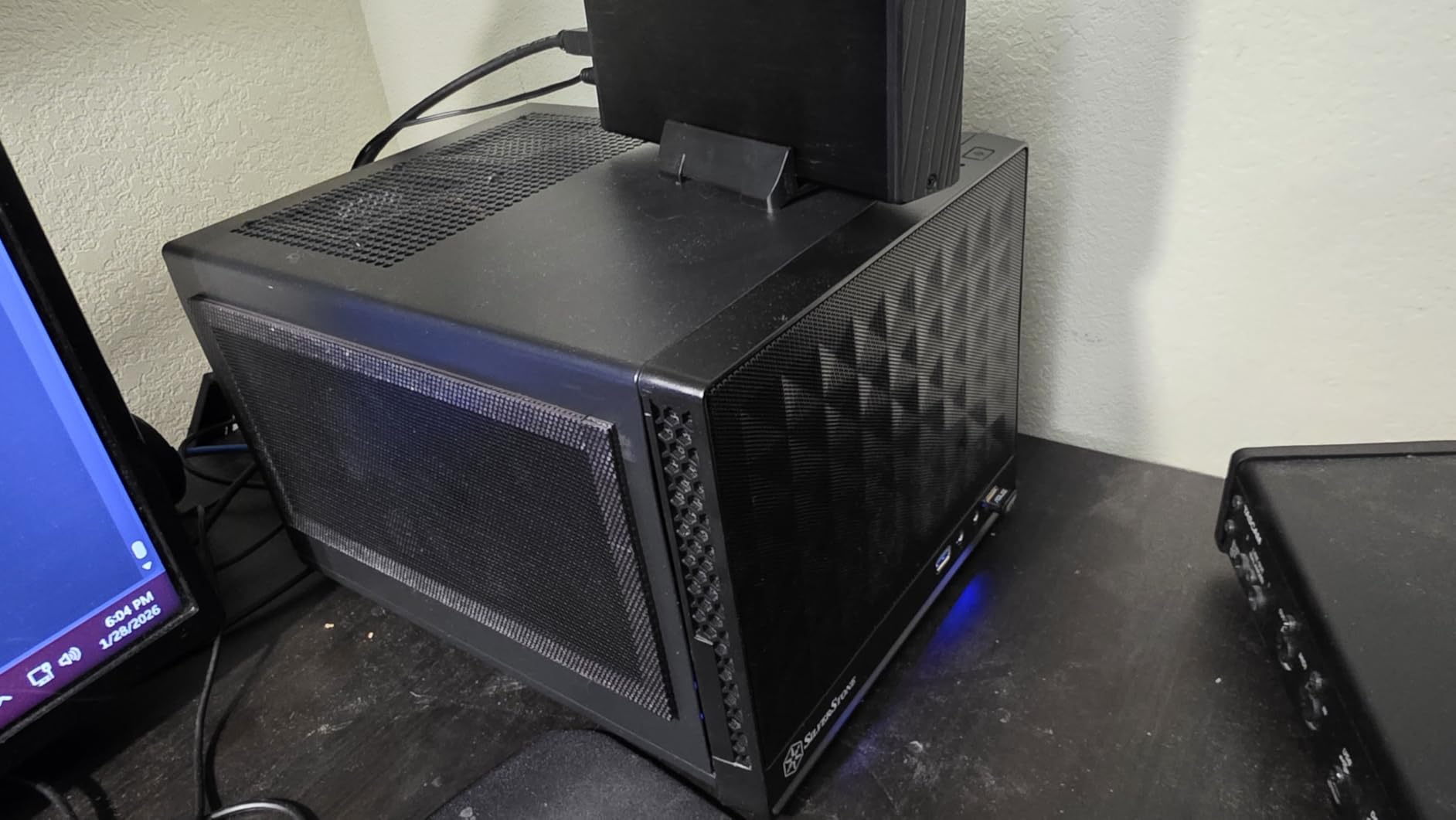 SilverStone Technology Ultra Compact Mini-ITX Computer Case with Mesh Front Panel Black (SST-SG13B-USA) customer photo 2