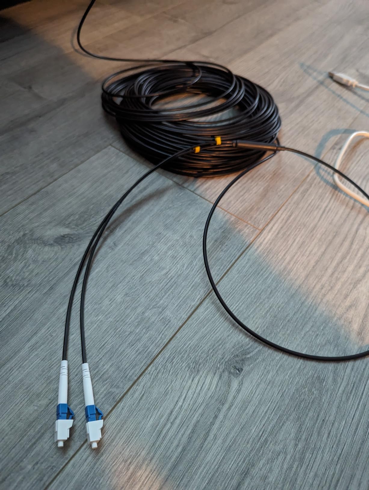 100ft/30m LC to LC Armored Outdoor Fiber Optic Cable, Single Mode Duplex Fiber Patch Cable, 9/125um LC Fiber Jumper, (OS1/OS2 Compatible), Low Friction LSZH, Black customer photo 1