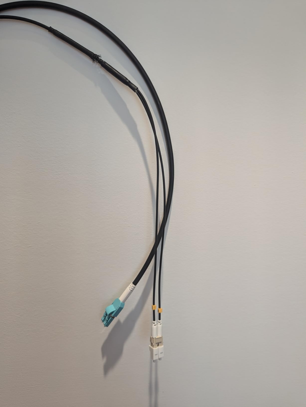 200ft/61m OD-5mm Industrial TPU OM3 Fiber LC to LC Outdoor Armored Fiber Patch Cable, Duplex Multimode Fiber Optic Cable, 40Gb 10Gb, 50/125, Uniboot LC-LC with Pulling Eye Kit Installed on one end customer photo 1