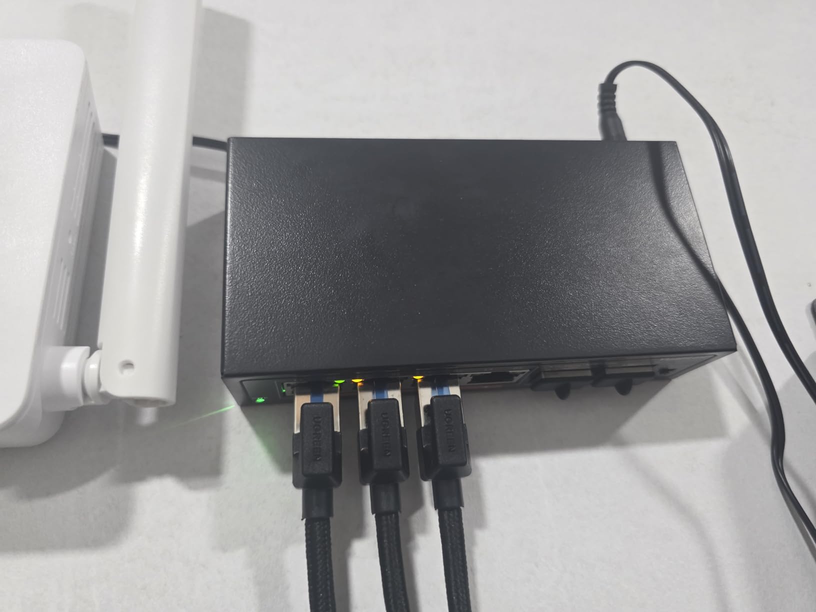 YuanLey 8-Port 10G Ethernet Switch, 6 x 10Gbps RJ45 Ports, 2X 10Gbe SFP+ Ports, Support 10G/5G/2.5G/1G/100Mbps Speed Auto-Negotiation, 160Gbps Switching Capacity customer photo 1
