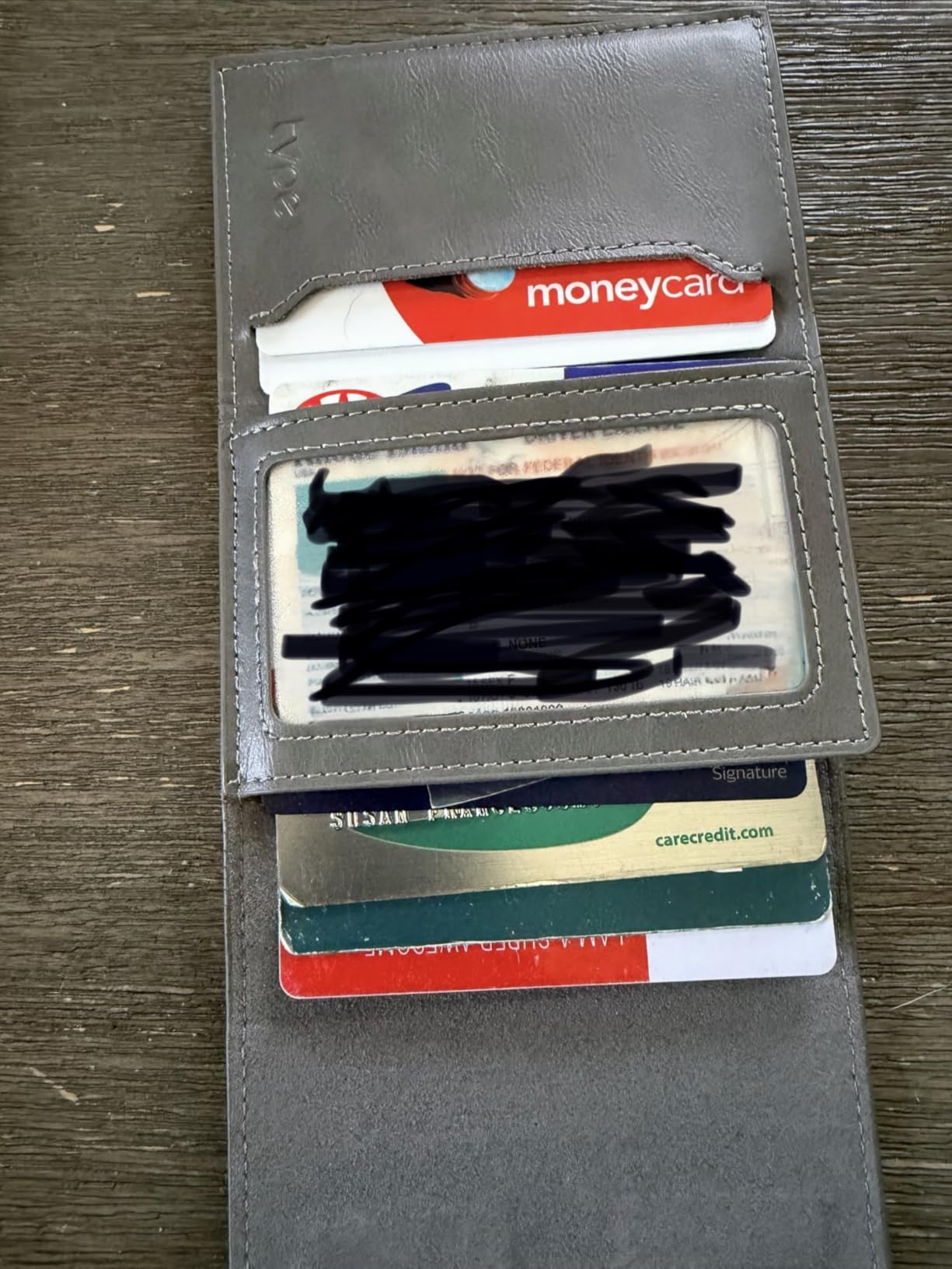 typecase AirTag Wallet for Men: Compatible with Apple AirTag (1st & 2nd Generation), RFID Blocking, Genuine Leather, Slim & Minimalist Design - 14 Card Capacity | ID Window | Cash Slot (Carbon Fiber) customer photo 1