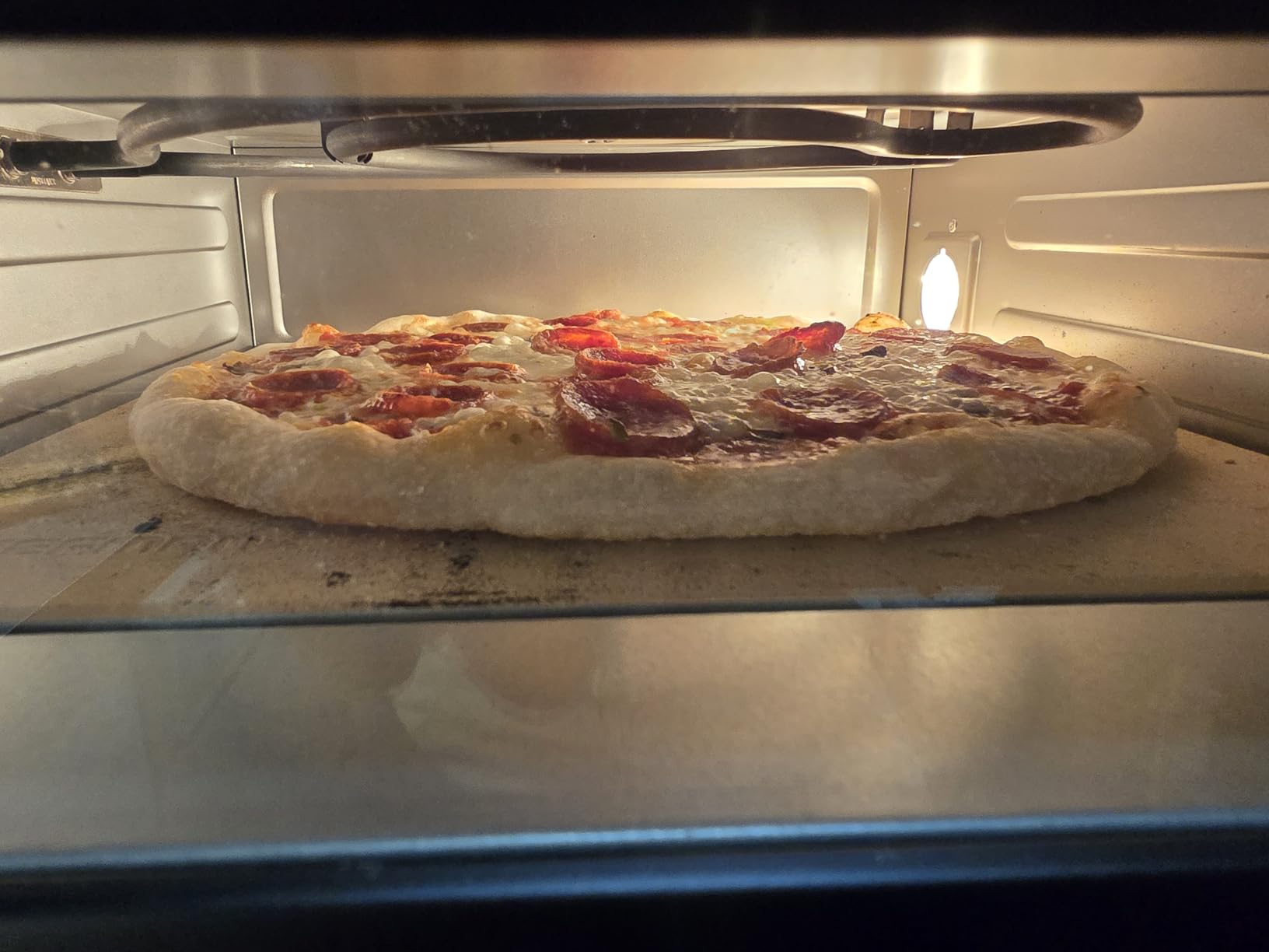 Chefman Indoor Pizza Oven - Makes 12 Inch Pizzas in Minutes, Heats up to 800°F - Countertop Electric Maker with 5 Touchscreen Presets, Pizza Stone and Peel Included - Stainless Black customer photo 1
