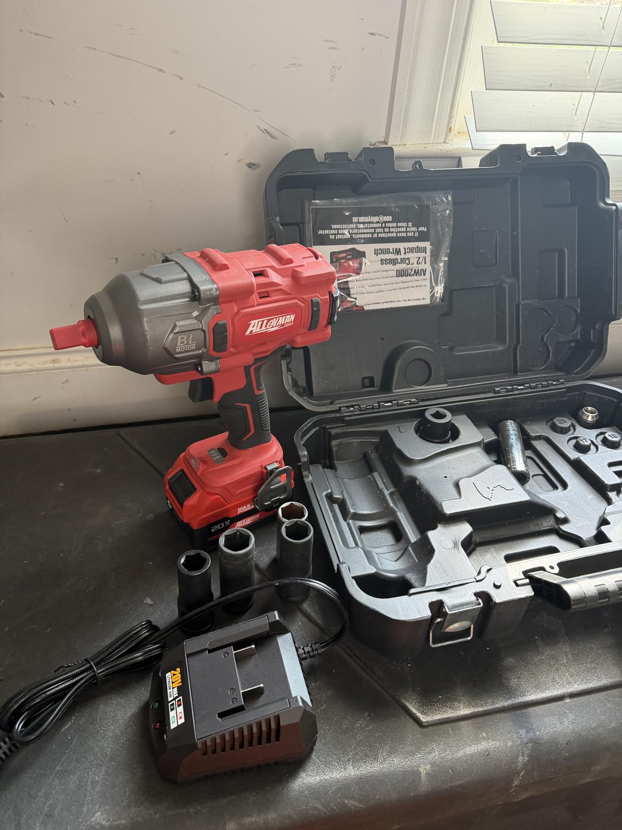 Alloyman Cordless Impact Wrench, 1475Ft-lbs (2000N.m) 1/2 High Torque Brushless Impact Gun, 20V Power Impact Driver, 4000mAh Battery,3 Sockets, Brushless Motor Variable Speeds for Car/Truck RV/Mower customer photo 1