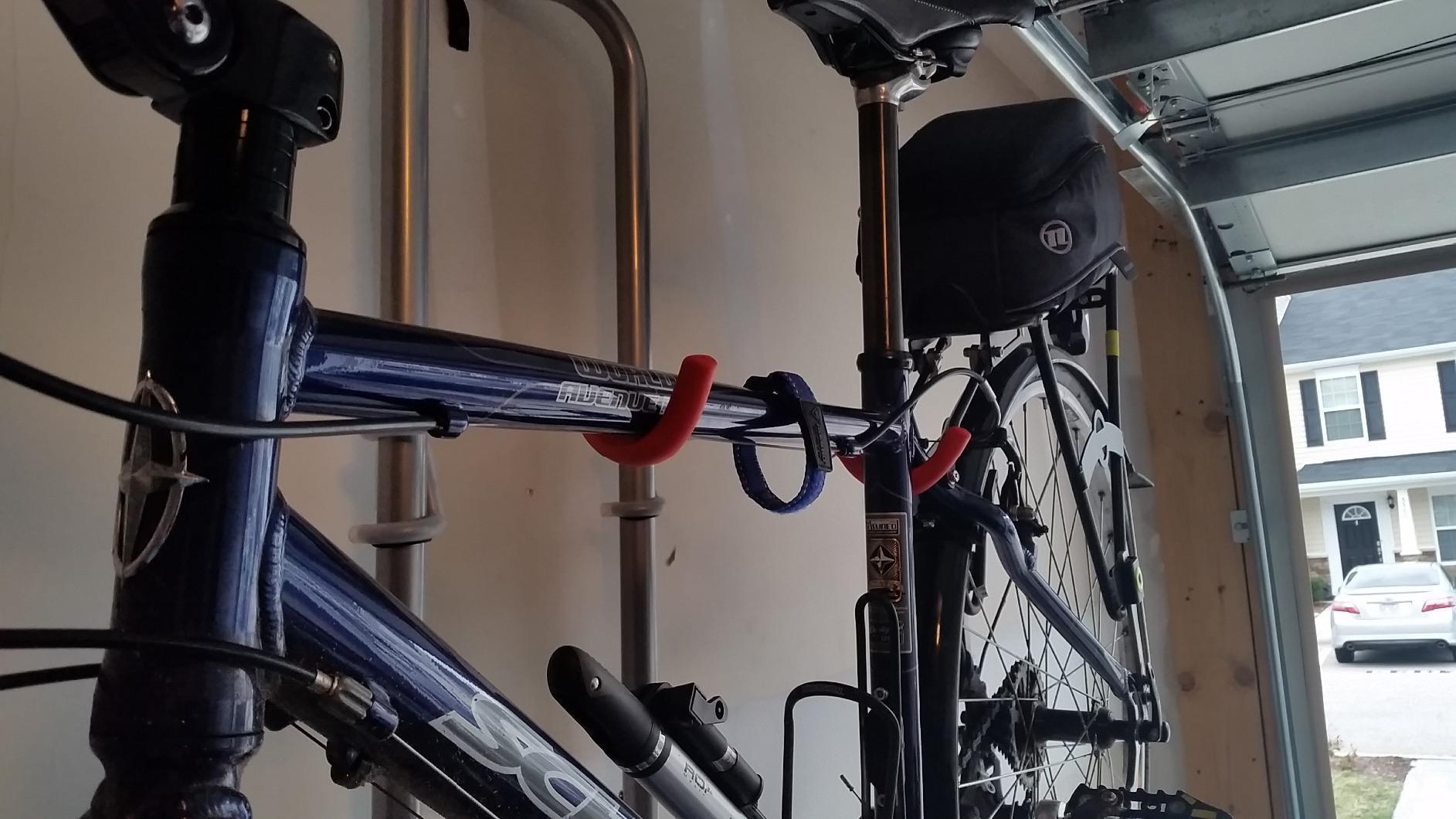 Delta Cycle Two Bike Gravity Pole Stand Garage, 2 Bike Storage Rack, No Drilling Required, Fully Adjustable Vertical Bike Rack for Any Style Bicycle, Leaning Wall Bike Rack Holds Up to 60 lbs customer photo 1