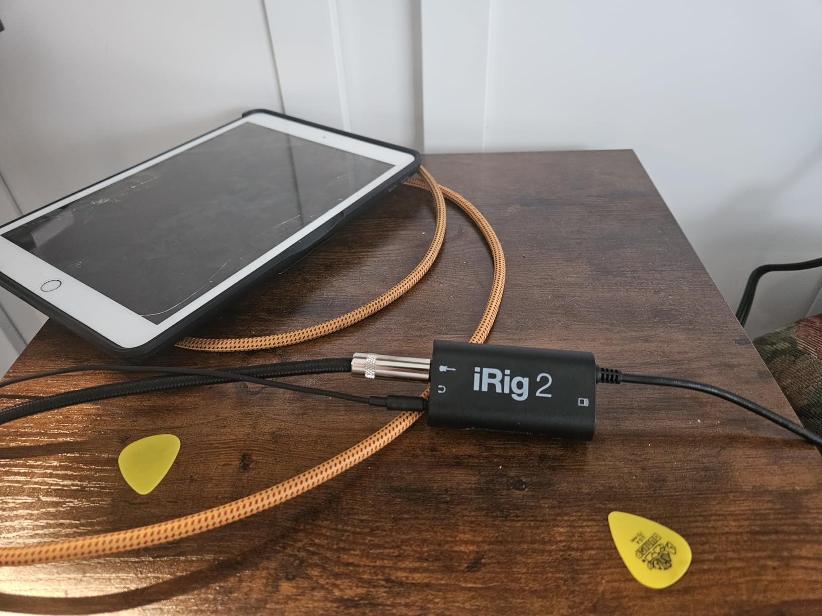 IK Multimedia iRig 2 portable guitar audio interface, lightweight audio adapter for iPhone and iPad with instrument input and headphone/amplfier outs customer photo 2