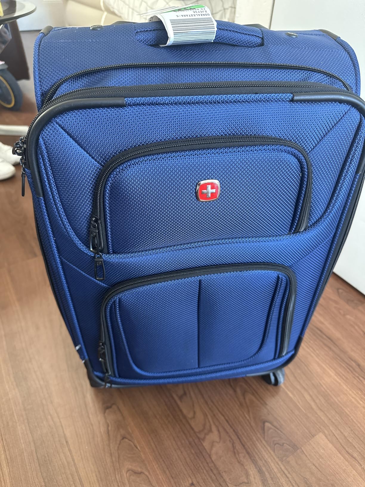 SWISSGEAR Sion Softside Expandable Spinner Luggage Durable Lightweight Travel Suitcase, Teal, Checked-Medium customer photo 2