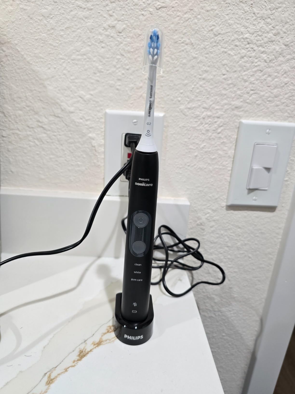 Philips Sonicare ProtectiveClean 5100 Rechargeable Electric Toothbrush - Pressure Sensor, 3 Cleaning Modes, Black, HX6850/60 customer photo 1