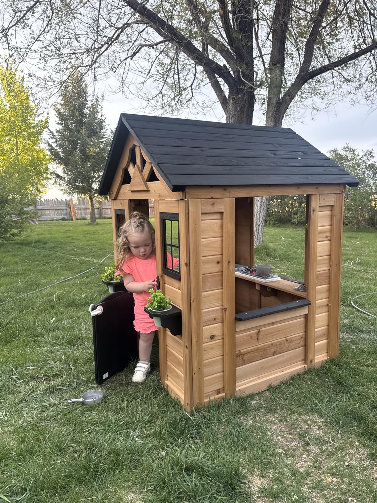 Backyard Discovery Sweetwater Cedar Wooden Kids Playhouse Cottage with Play Kitchen, Snack Bar, Half Door, Toy Phone, Windows, Flowerpot Holders, and Working Doorbell customer photo 1