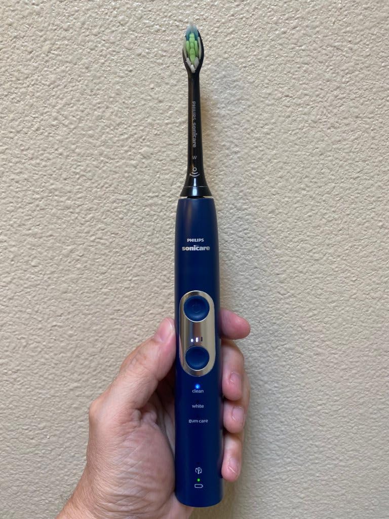Philips Sonicare ProtectiveClean 6100 Rechargeable Electric Toothbrush, Pressure Sensor, 3 Cleaning Modes, SmarTimer and QuadPacer, 14-Day Battery Life, Travel Case, Deep Purple, HX6471/03 customer photo 1