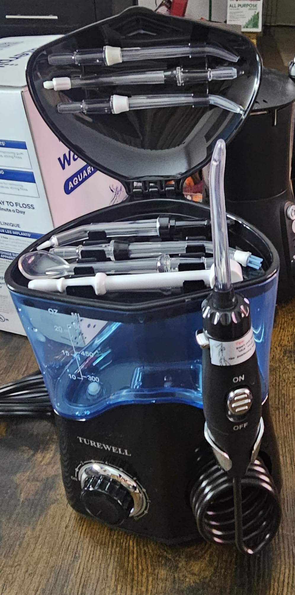 TUREWELL Water Dental Flosser for Teeth/Braces, Water Teeth Cleaner 8 Jet Tips and 10 Pressure Levels, 600ML Large Water Tank Oral Irrigator for Family (Black) customer photo 1