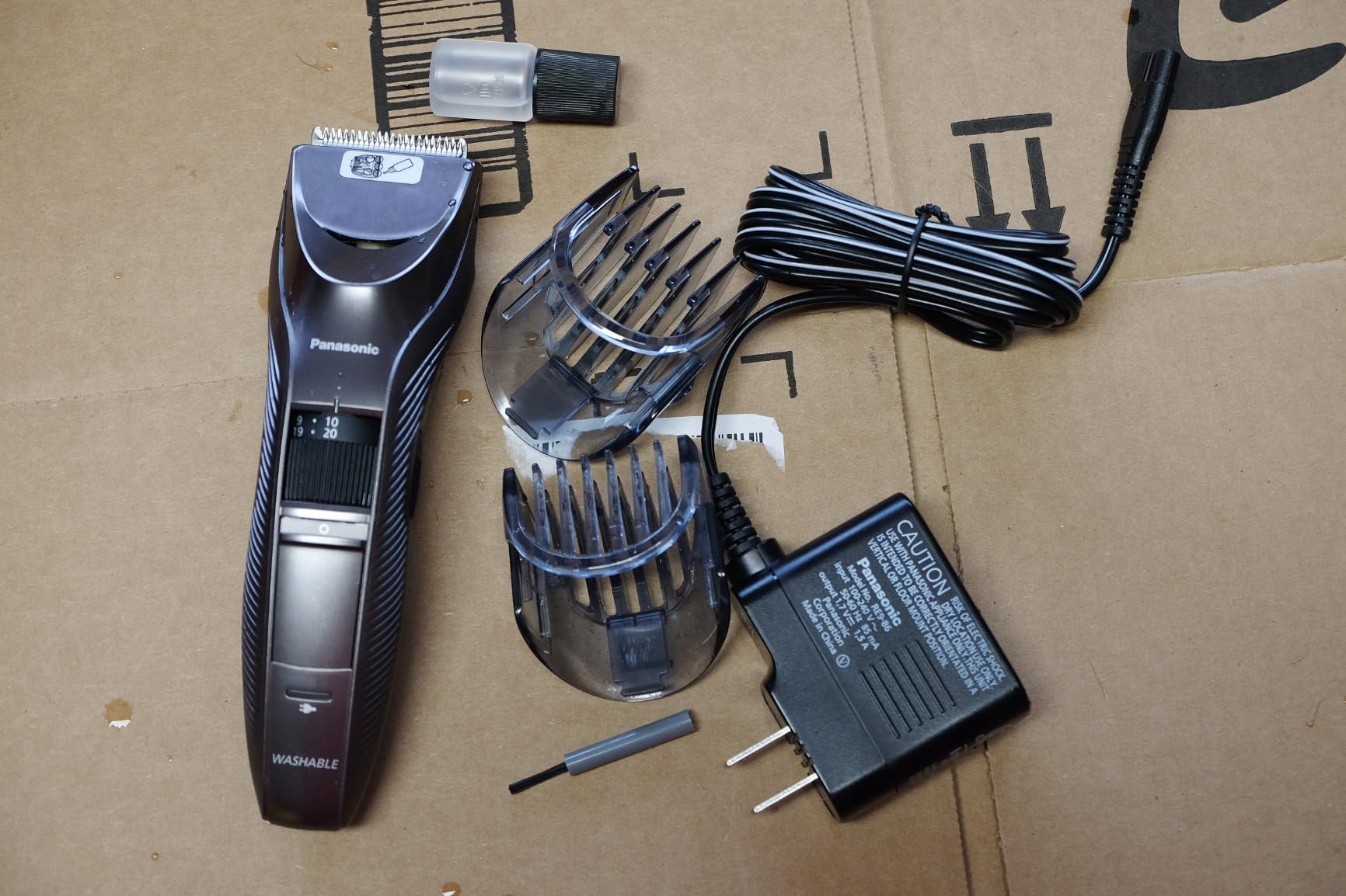 Panasonic Performance Hair Clippers with 2 Attachments and Adjustable Length Settings, Corded or Cordless Trimmer for Hair and Beard - ER-GC63-H (Silver) customer photo 1