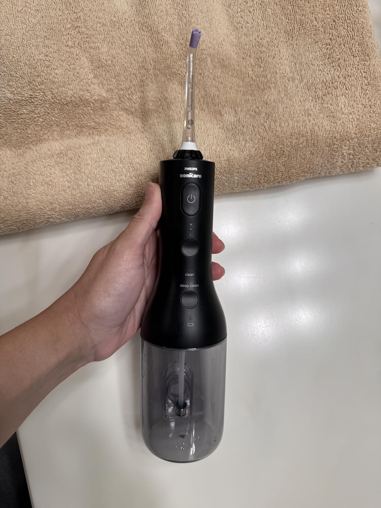 Philips Sonicare Cordless Power Flosser 3000 - Water Flosser with Innovative Quad Stream Technology, Oral Irrigator with 2 Flossing Modes and 3 Pressure Levels, IPX7 Waterproof, Black, HX3826/23 customer photo 1