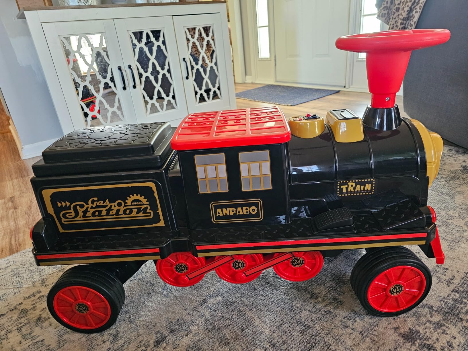 ANPABO 2-Seater Ride On Train Trackless, 12V Ride On Toy with Height-Adjustable Seat, Extra Storage, Headlight, Train Whistle & Music, Electric Car for Kids 3+ (Red) customer photo 1
