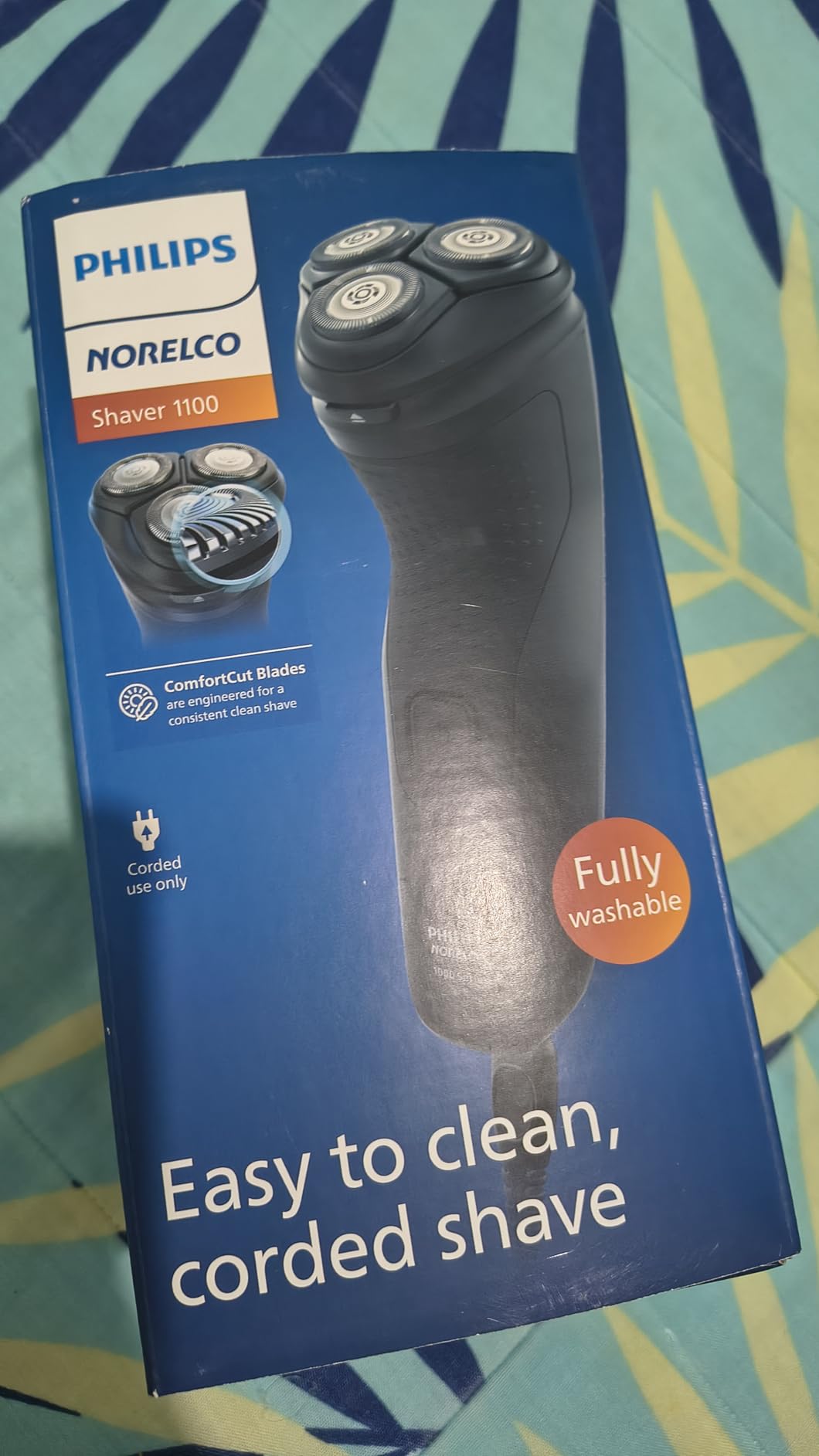 Philips Norelco Shaver 1100 Series, Dry Electric Shaver, 27 Self-Sharpening ComfortCut Blades, 4D Floating Heads, P-Cap, Deep Black, Model S1016/90 customer photo 1