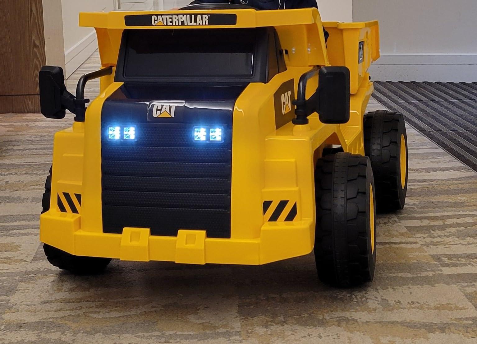 Costzon Ride on Dump Truck, 12V Licensed Caterpillar Kids Electric Vehicle W/Remote Control, Megaphone, Shock Absorbers, Dump Bed, MP3, Ride on Construction Vehicle for Kids 3-6 customer photo 1