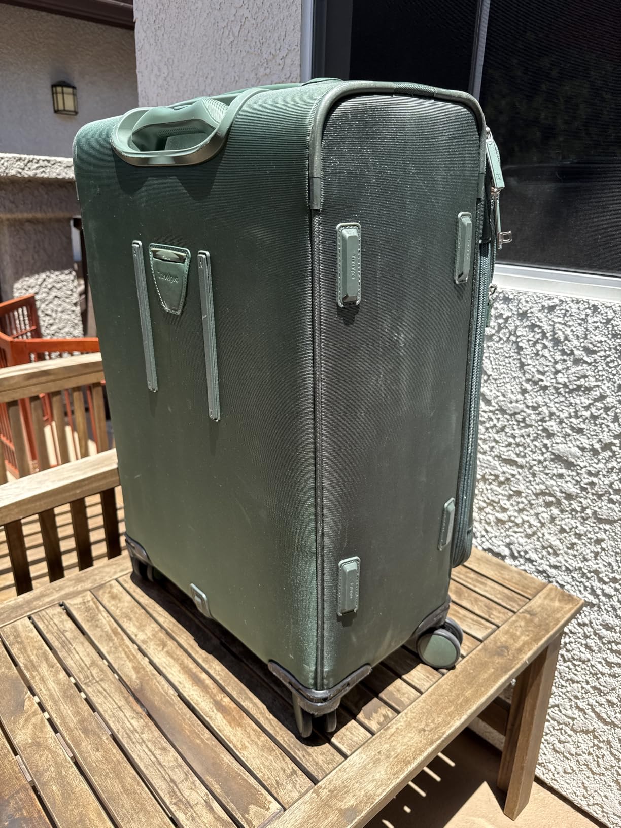 Travelpro VersaPack+ Lightweight Softside Expandable Checked Luggage, 8 Spinner, TSA Lock, Checked Large 29-Inch, Desert Sage Green customer photo 1