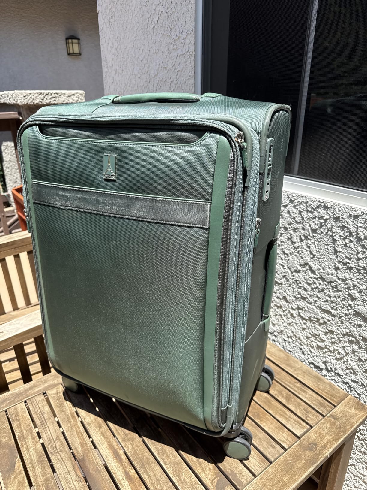 Travelpro VersaPack+ Lightweight Softside Expandable Checked Luggage, 8 Spinner, TSA Lock, Checked Large 29-Inch, Desert Sage Green customer photo 2
