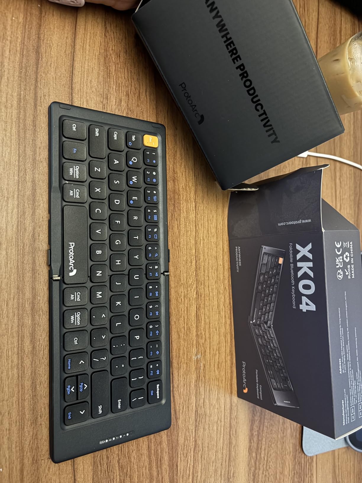 ProtoArc Foldable Compact Keyboard, XK04 Portable Bluetooth Keyboard with PU Leather Cover, Pocket-Sized Wireless Travel Keyboards for iPad, iPhone, Smartphone, Tablet and Laptop - Black customer photo 2