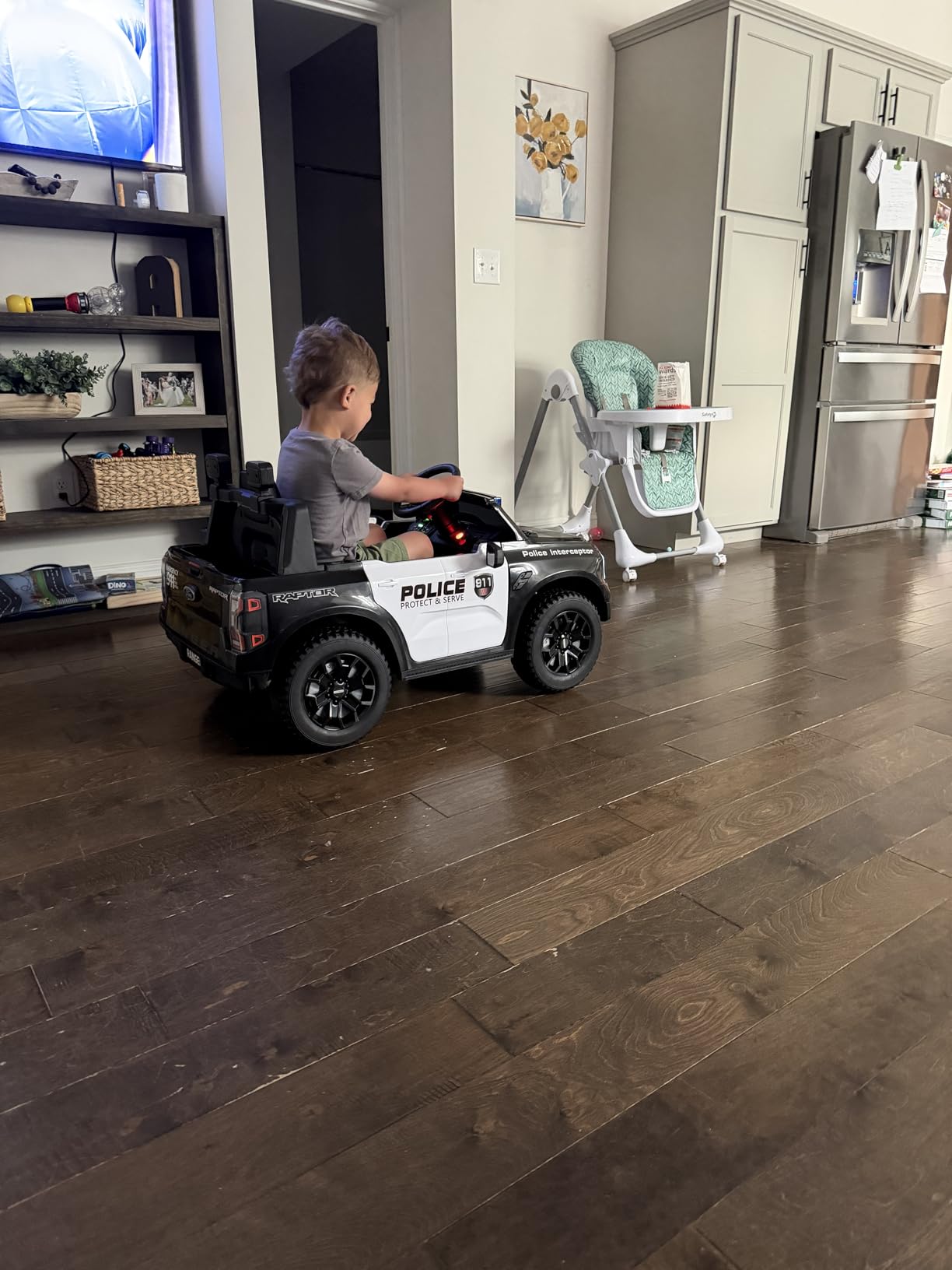 ANPABO Licensed Ford Police Car Ride On, 12V Kids Cars to Drive w/Realistic LED Siren Flashing Light, Megaphone, Remote Control, Music, Storage Trunk, Electric Cars for Kids Ages 2+, Black customer photo 2