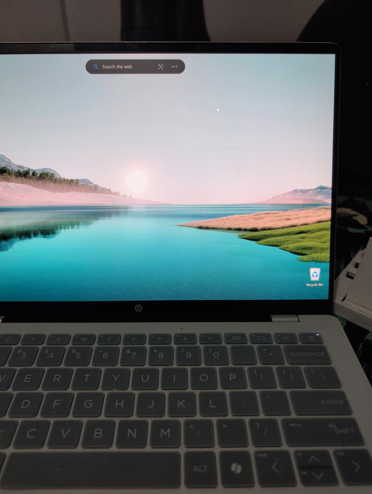 HP OmniBook 5 14 inch Next Gen AI PC, OLED Display, Snapdragon X Plus X1P-42-100, 16 GB RAM, 1 TB SSD, Qualcomm Adreno GPU, Windows 11 Home, Glacier Silver, 14-he0099nr customer photo 1