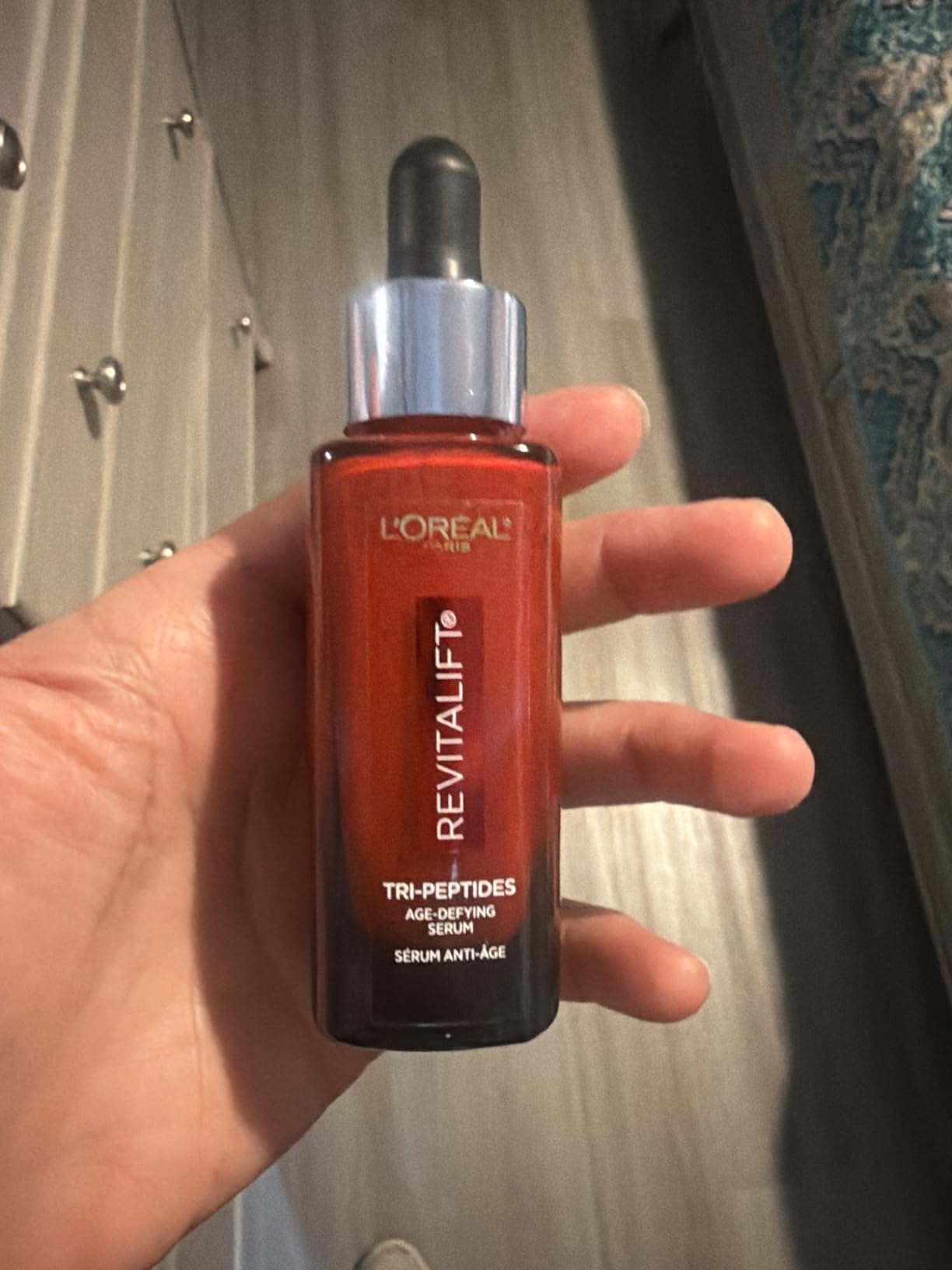 L'Oreal Paris Revitalift Triple Power Face Serum with Tri-Peptides, Hyaluronic Acid and Vitamin C, Anti Aging, Anti Wrinkle Serum to Firm and Brighten, 1 FL oz customer photo 1