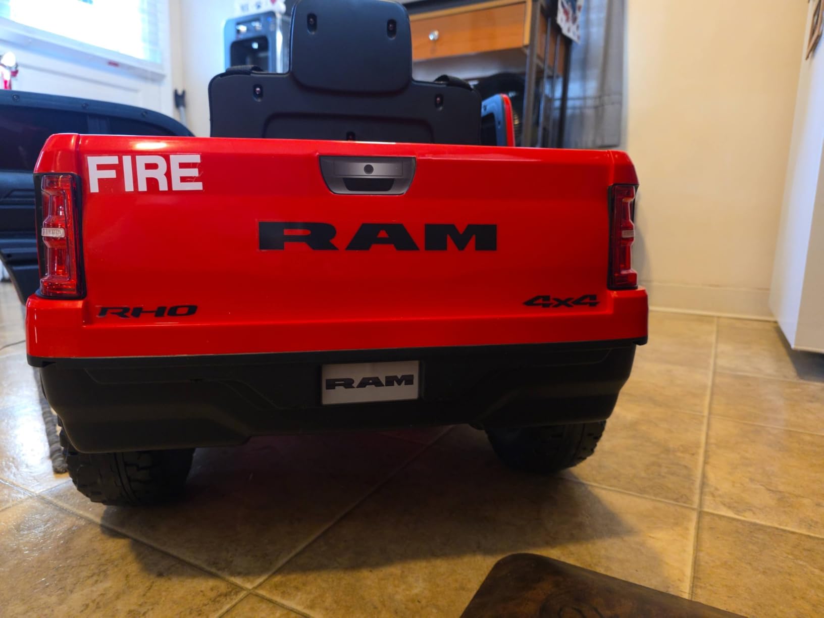 First Ride On 12V Ride on Fire Truck for Toddlers, Licensed RAM 1500 RHO Electric Car for Kids with Remote Control, Firetruck Ride on Toys w/Siren-Call, Bluetooth, Bed Storage (Red 50W) customer photo 1