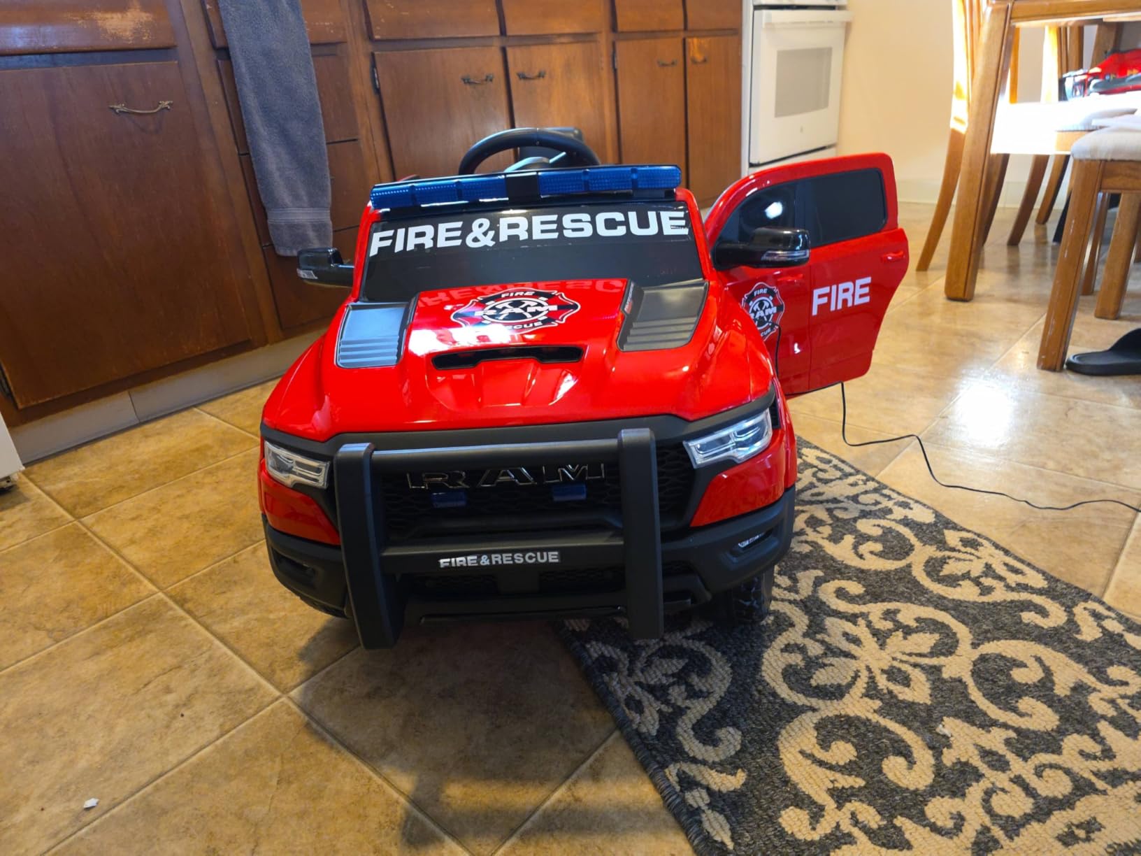 First Ride On 12V Ride on Fire Truck for Toddlers, Licensed RAM 1500 RHO Electric Car for Kids with Remote Control, Firetruck Ride on Toys w/Siren-Call, Bluetooth, Bed Storage (Red 50W) customer photo 2