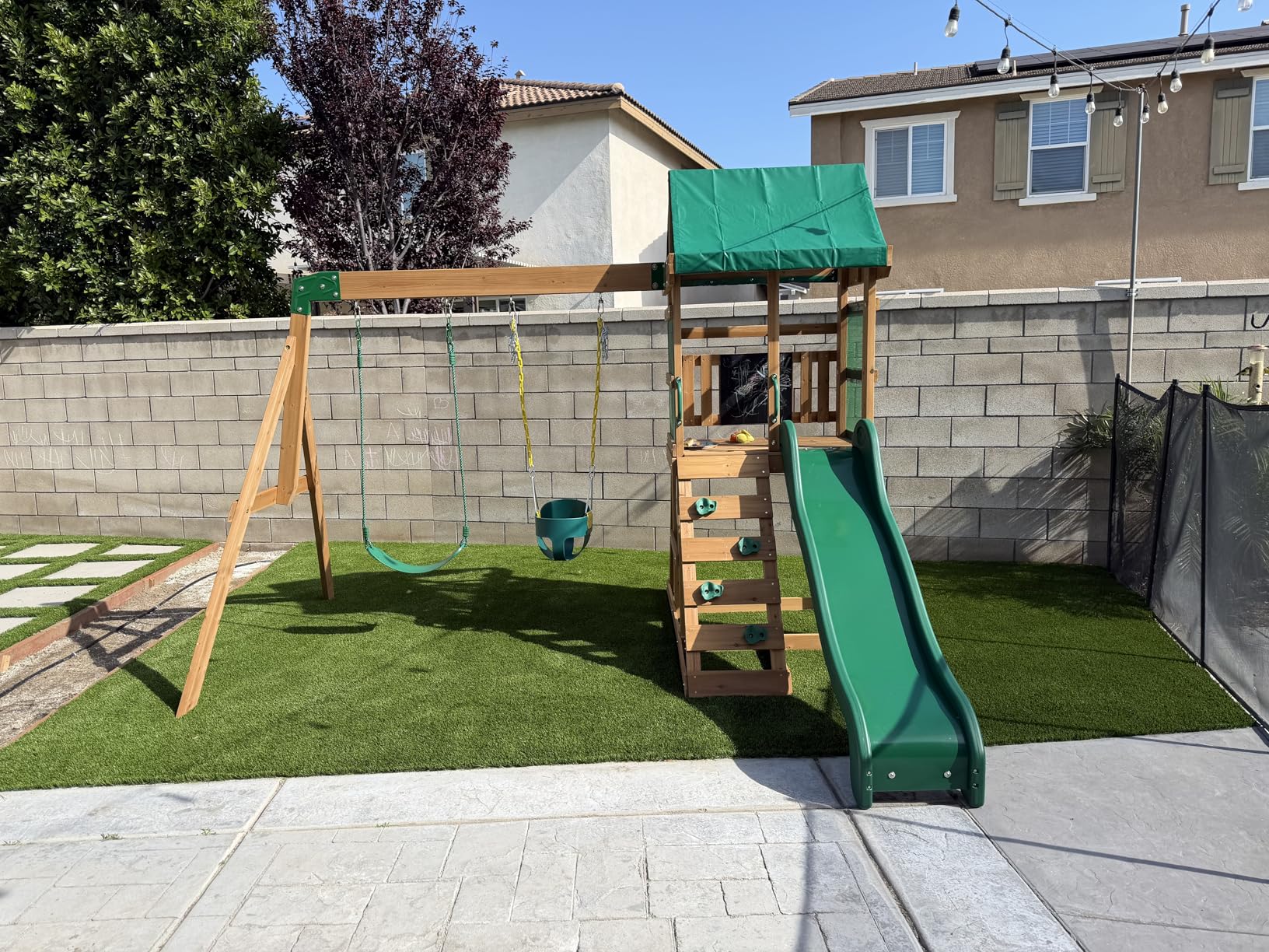 Backyard Discovery Bay Pointe Cedar Wood Swing Set with Wave Slide, Play Deck, Rock Wall Ladder, Belt Swings, Chalkboard, Canopy Roof, Outdoor Playset customer photo 1