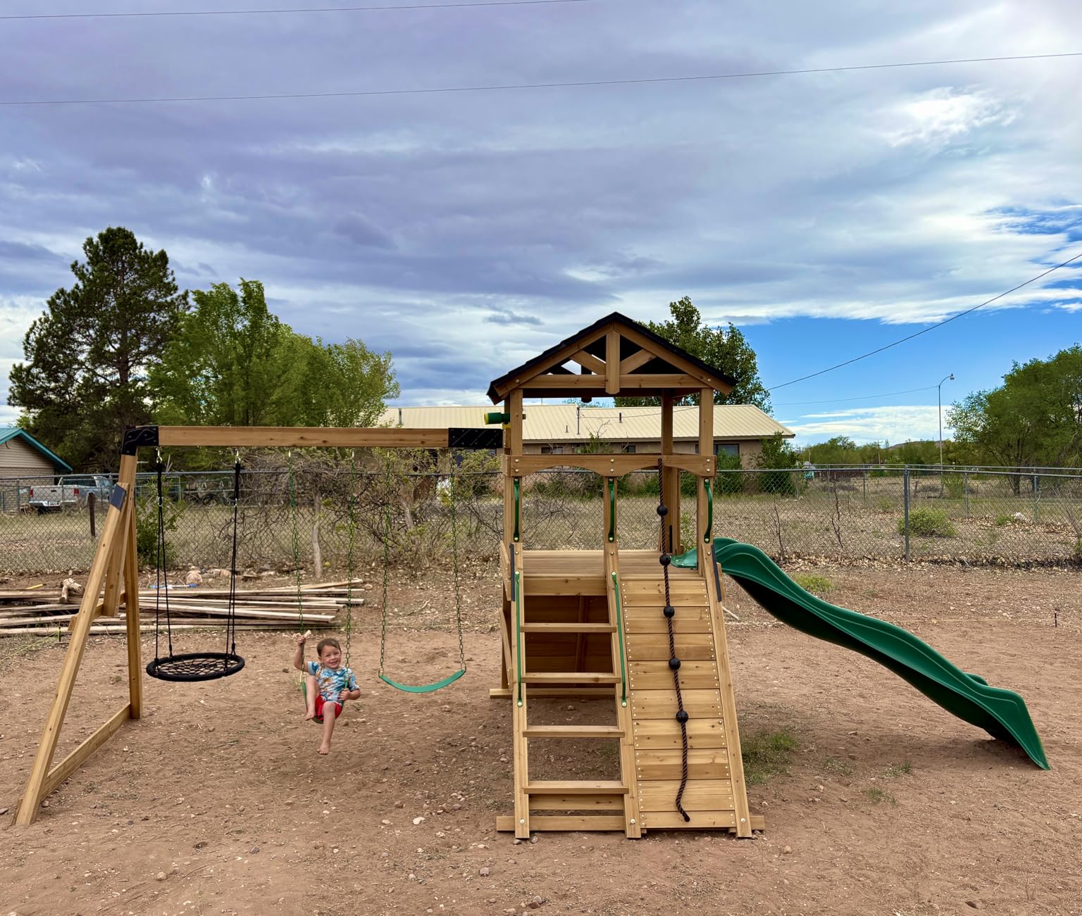 Backyard Discovery Endeavor II Cedar Wood Swing Set with Wave Slide, Play Deck, Double Rock Wall, Picnic Table, Climbing Wall, Belt Swings, Web Swing, Toy Telescope, Step Ladder, Outdoor Playset customer photo 2