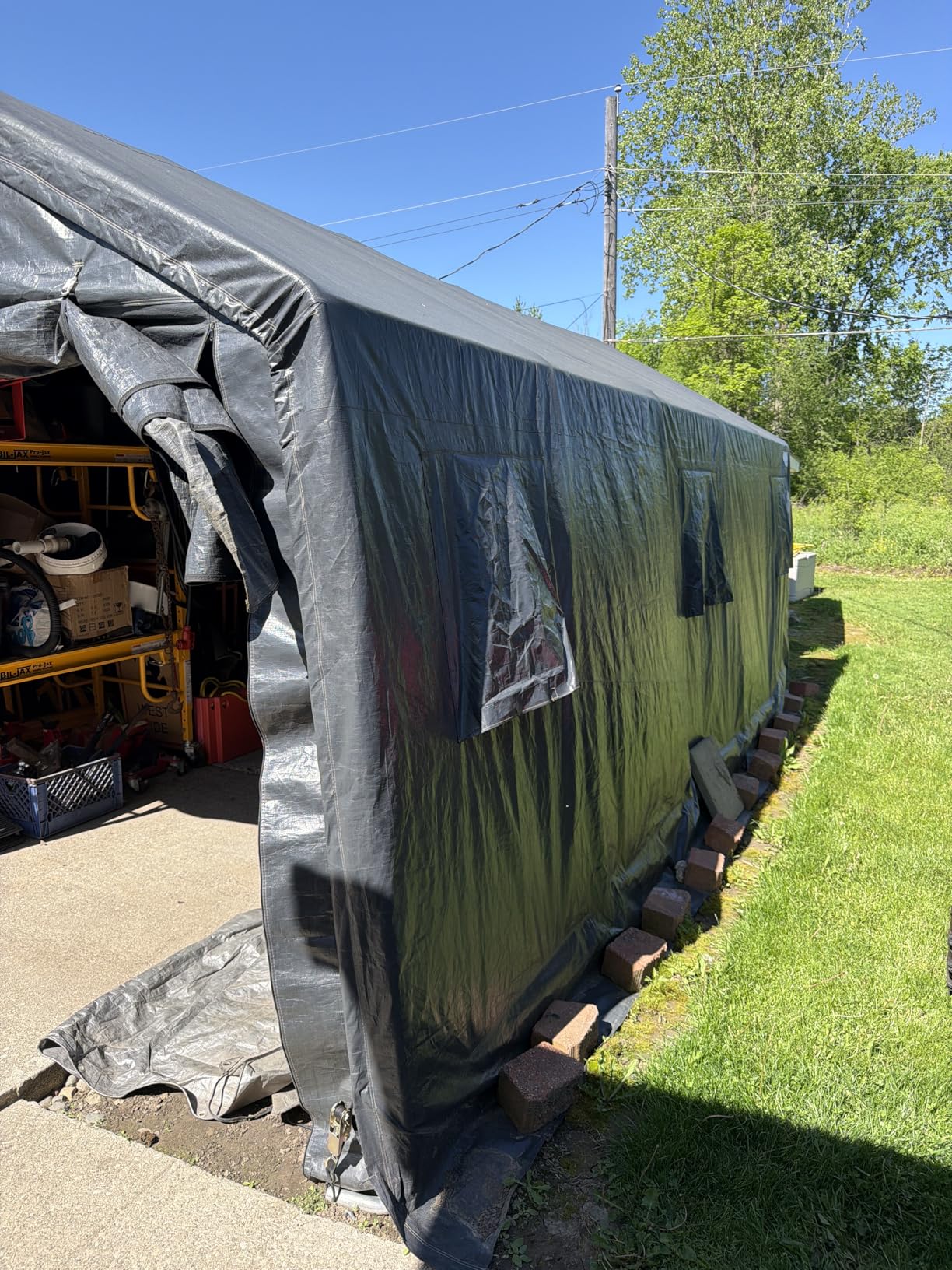 ADVANCE OUTDOOR 10X15 ft Garage Shelter Steel Metal Peak Roof Portable Storage Shed Carport for Motorcycle Boat, or Garden Tools with 2 Roll up Doors & Vents, Gray customer photo 2