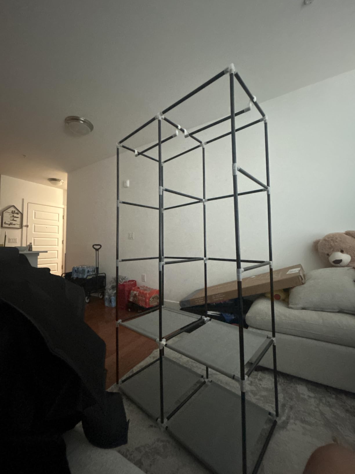 VTRIN Portable Closet Wardrobe Closet for Hanging Clothes with 4 Storage Shelves, 2 Hanging Rods and 6 Pockets, Stable and Easy Assembly Clothes Rack with Cover Free Standing Closet for Bedroom, Black customer photo 1
