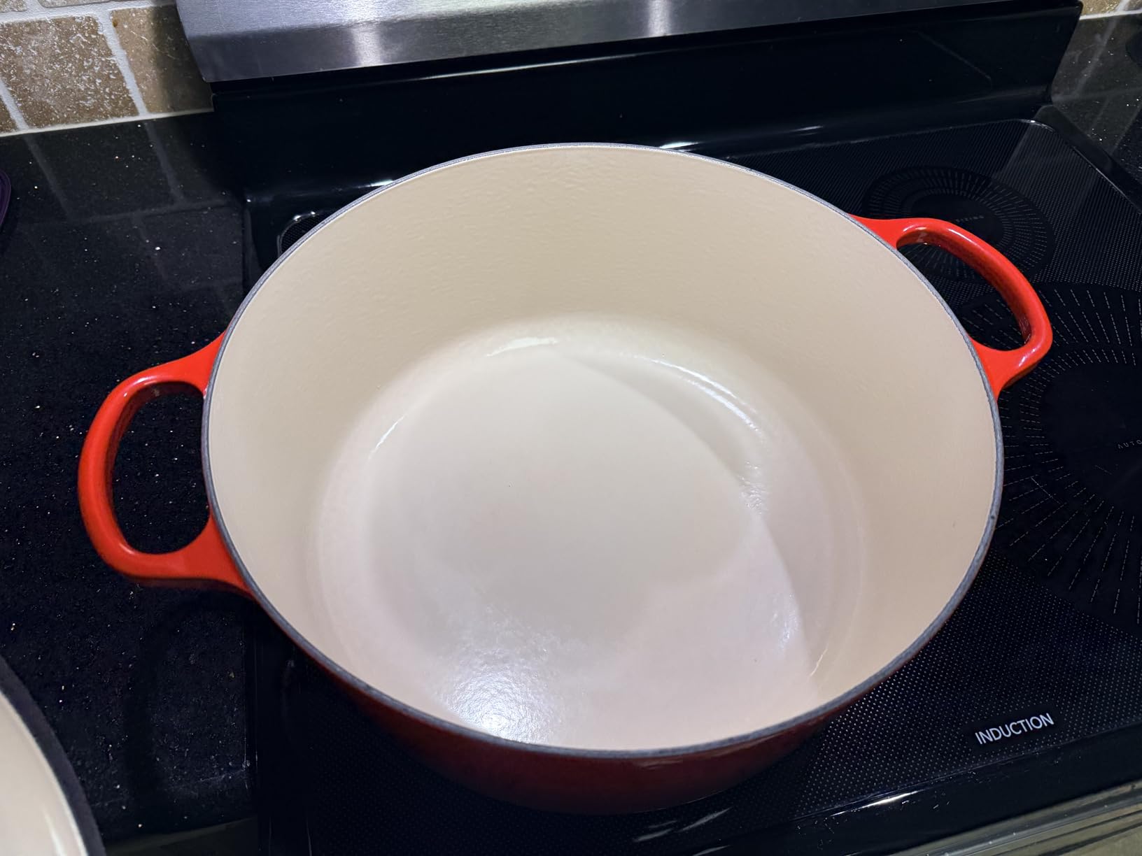 Le Creuset Enameled Cast Iron Round Dutch Oven, 7.25 qt., Cerise customer photo 2