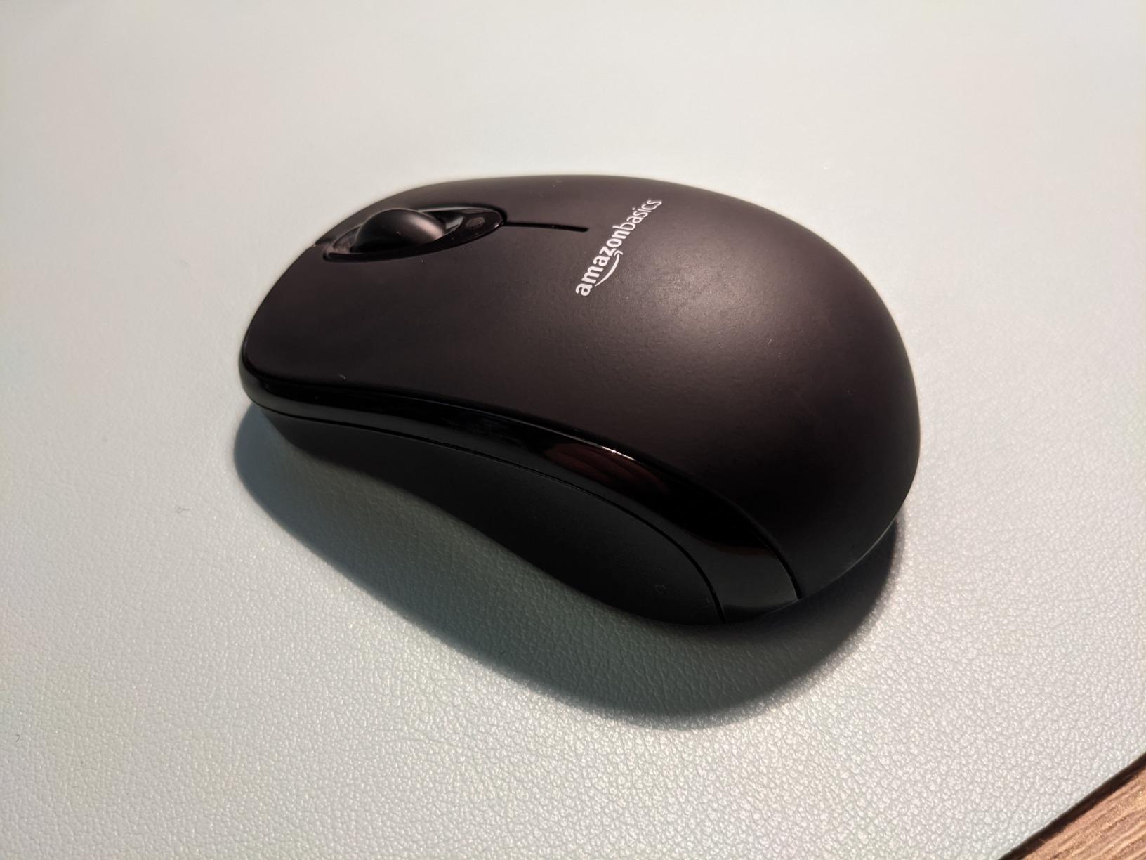 Amazon Basics 2.4 GHz Wireless Optical Computer Mouse with USB Nano Receiver, Portable, No Wires, Smooth Tracking, Multi-Device Compatibility, Black customer photo 2