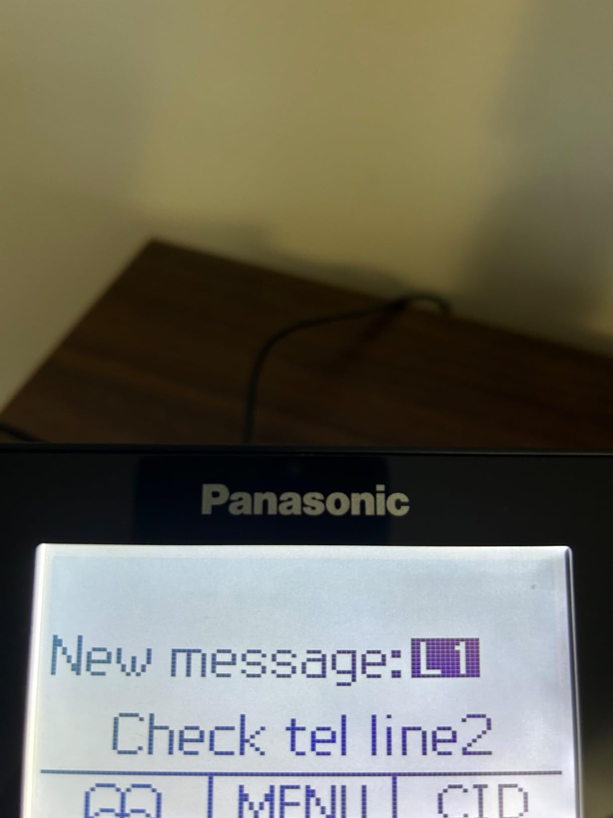 Panasonic 2-Line Corded/Cordless Phone System with 1 Handset - Answering Machine, Link2Cell, 3-Way Conference, Call Block, Long Range DECT 6.0, Bluetooth - KX-TG9581B (Black) customer photo 1