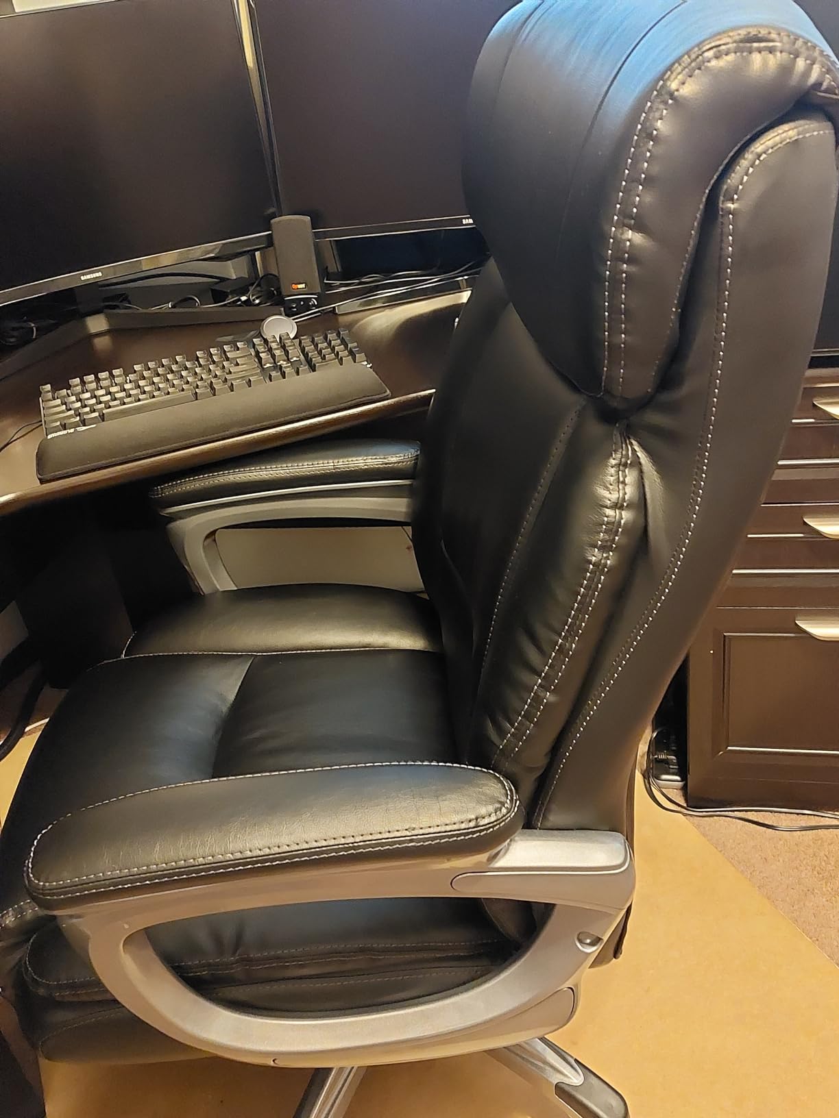 STAPLES Lockland Big & Tall Bonded Leather Manager Chair, Black, Adjustable | Cushioned seat with metal frame for home office, workspace, or gaming use. customer photo 1