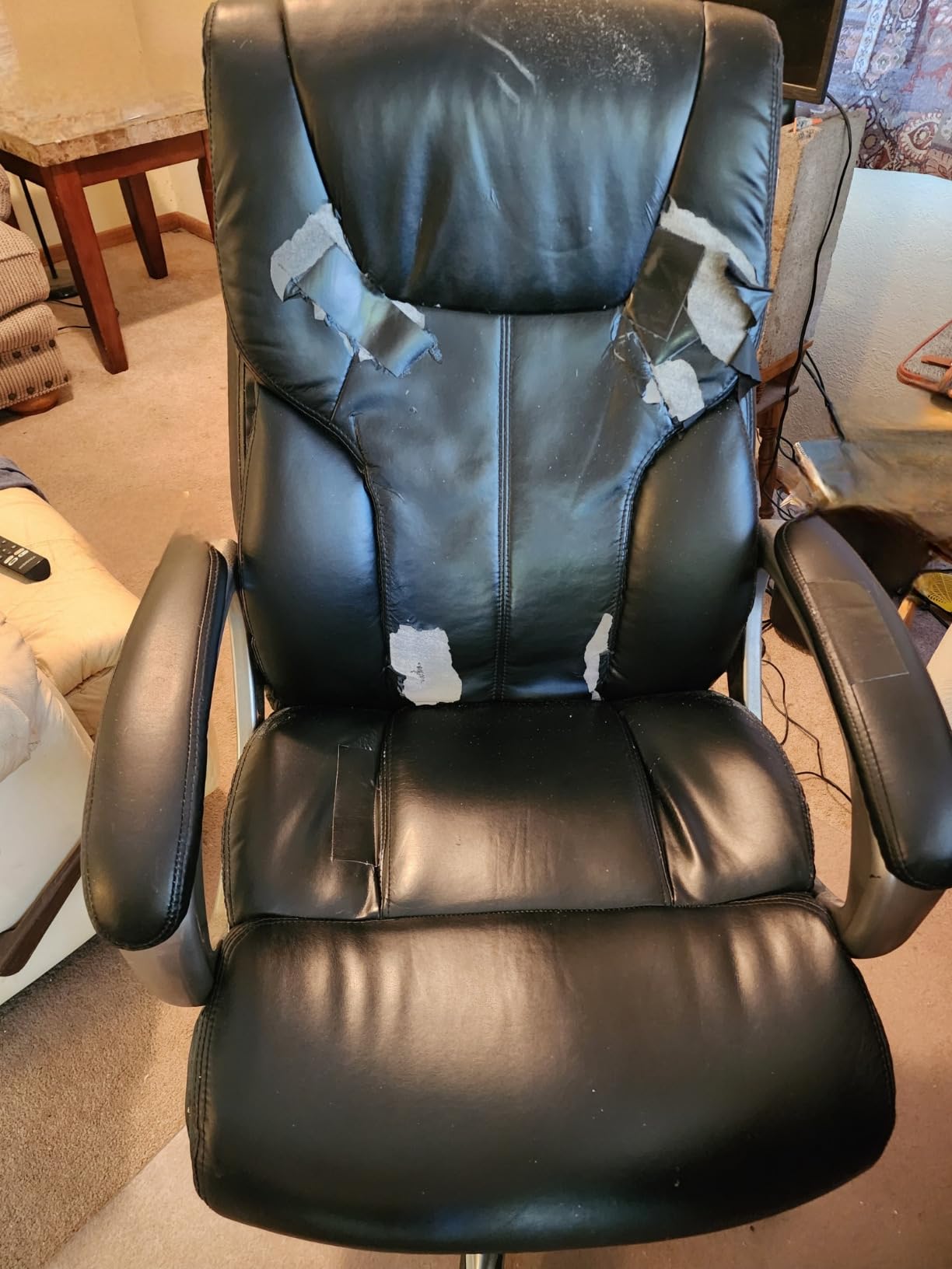Amazon Basics Executive High Back Office Chair, Adjustable Height, Tilt, Swivel, Padded Seat, Bonded Leather, Wheels, Black/Silver customer photo 1