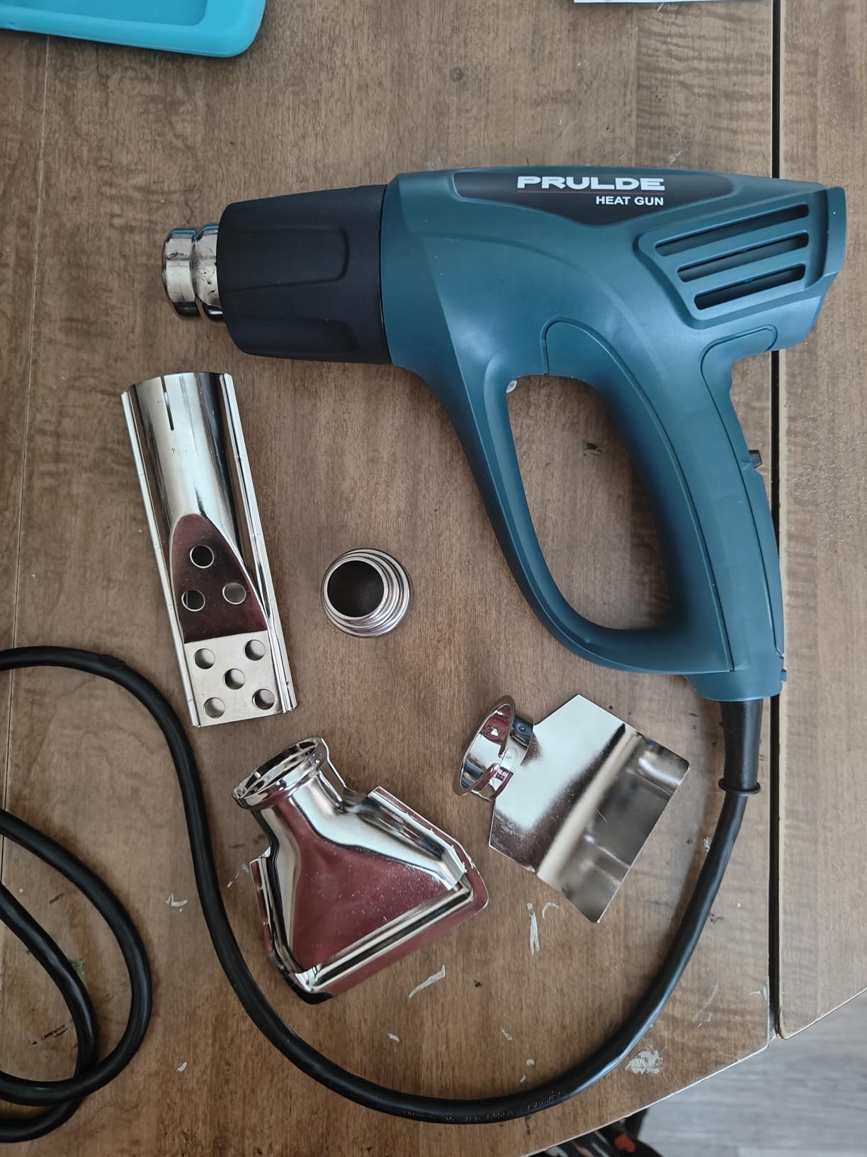 PRULDE Heat Gun, 1500W Dual Temperature Settings 572°F~1112°F Fast Heating Hot Air Gun with 6.5Ft Power Cord/4 Nozzles/Overload Protection for Crafts, Shrink Wrapping/Tubing, Paint Removing(N2190) customer photo 1