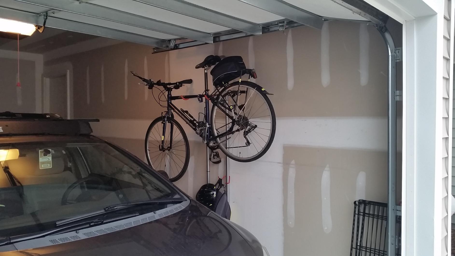 Delta Wall Ride Bike Rack Wall Mount with Tire Wall Guard Cycle – Vertical Bike Mount Holds Up to 100 lbs – Fully Adjustable Vertical Hanger Hook Design Provides Easy Bicycle Storage Access customer photo 2