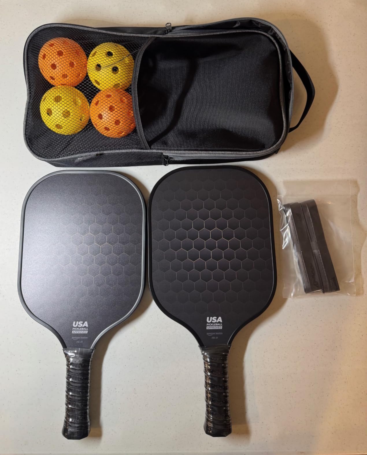 Amazon Basics Pickleball Paddles Set of 2, USAPA Approved Carbon Fiber Paddle with 4 Balls, Lightweight Pickle Ball Rackets, Carry Bag & Grips customer photo 1